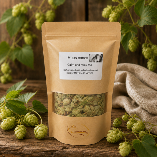 Package of Hops cones tea with green hops cones and leaves on a wooden background